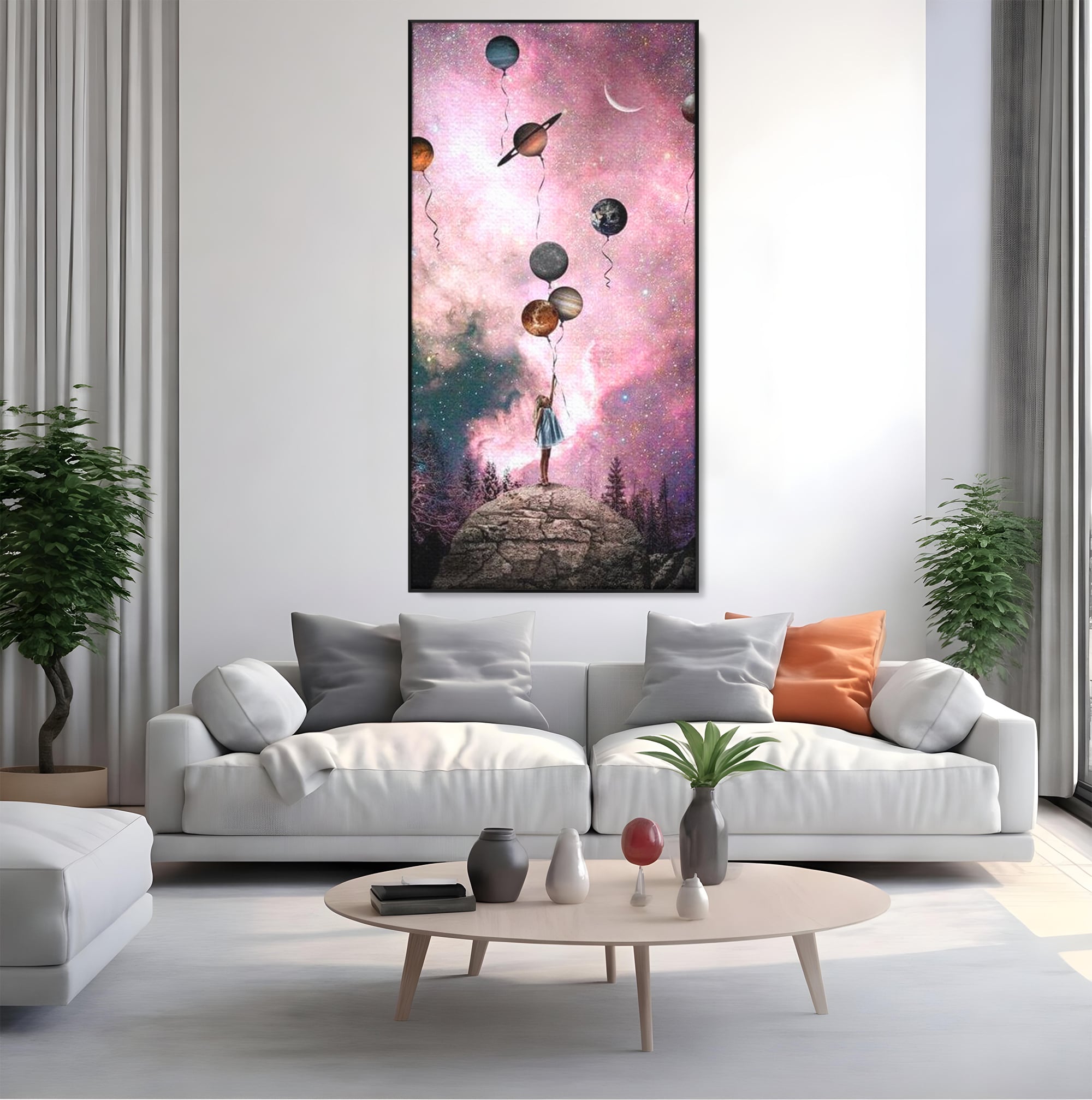 Tablou canvas cu ilustratie fetita tinand baloane planete, in rama de aluminiu negru, pe perete intr-un living